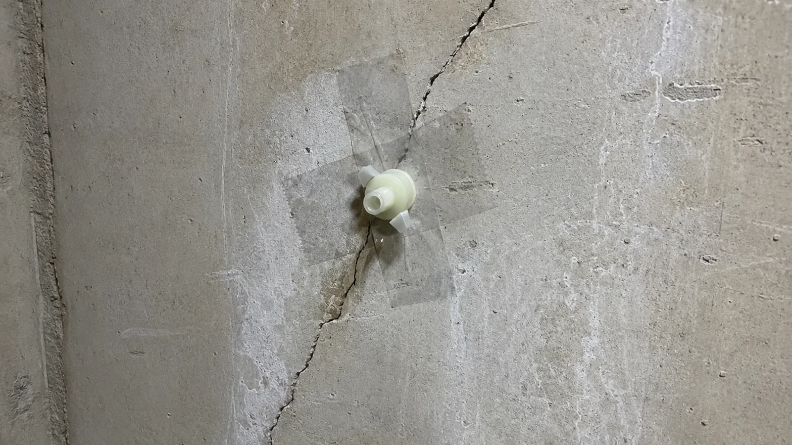 Foundation Crack Repair & Wall Stabilization in progress in a Grand Rapids-area basement