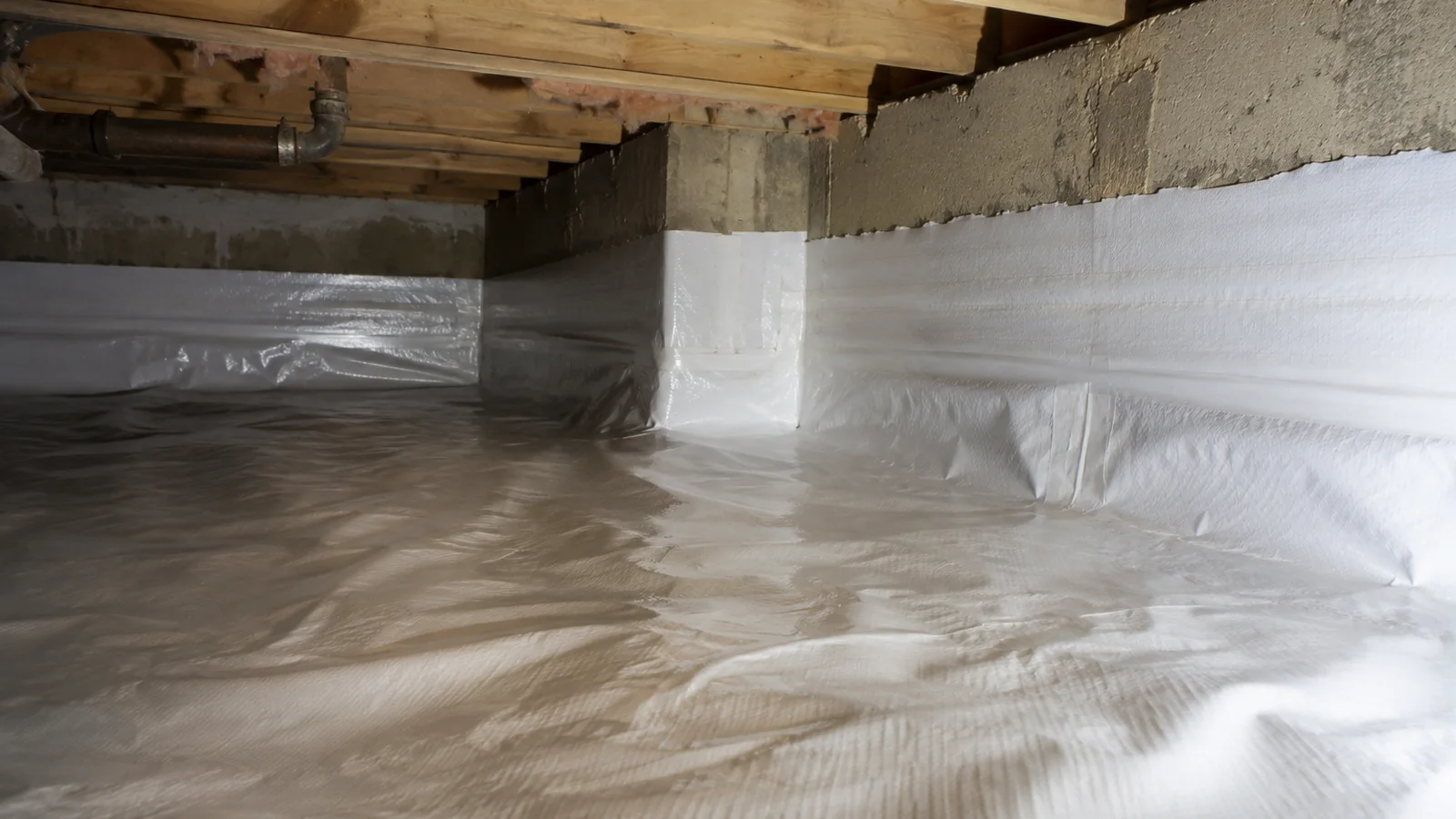 Crawl Space Moisture Control & Encapsulation in progress in a Grand Rapids-area basement